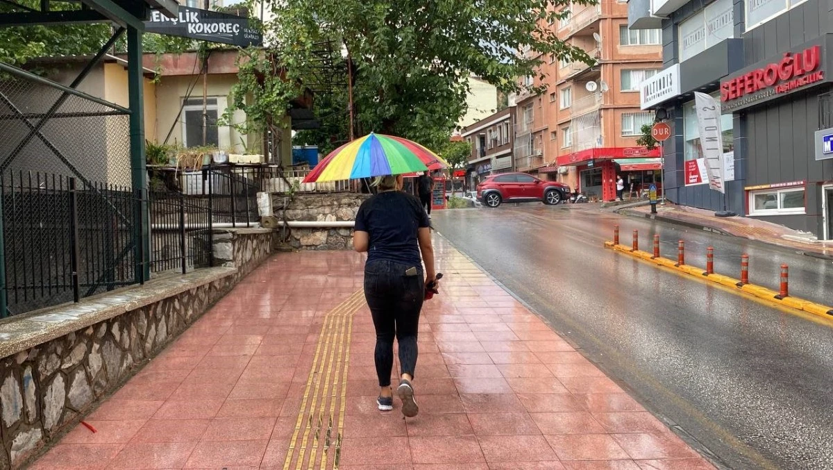 Aydın'da sağanak yağış vatandaşları serinletti