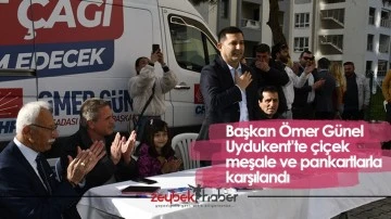 Başkan &Ouml;mer G&uuml;nel Uydukent&rsquo;te &ccedil;i&ccedil;ek meşale ve pankartlarla karşılandı
