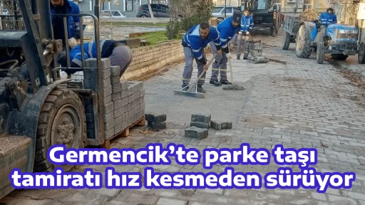 Germencik&rsquo;te parke taşı tamiratı hız kesmeden s&uuml;r&uuml;yor
