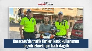 Karacasu'da trafik timleri kask kullanımını teşvik etmek i&ccedil;in kask dağıttı