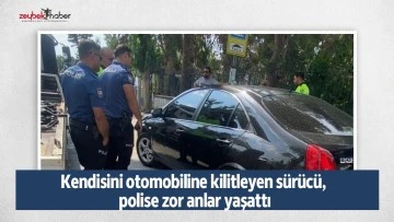 Kendisini otomobiline kilitleyen s&uuml;r&uuml;c&uuml;, polise zor anlar yaşattı