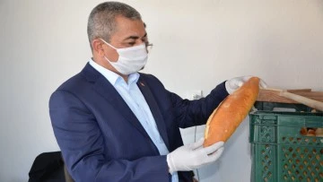 Ko&ccedil;arlı Belediyesi'nin &uuml;rettiği halk ekmeklere il&ccedil;e dışından talep artıyor