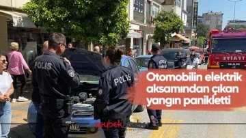 Otomobilin elektrik aksamından &ccedil;ıkan yangın panikletti